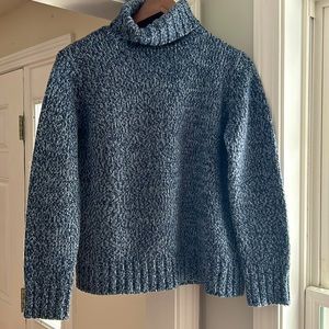 A navy/grey/light blue yarn Jones of NY turtleneck sweater.